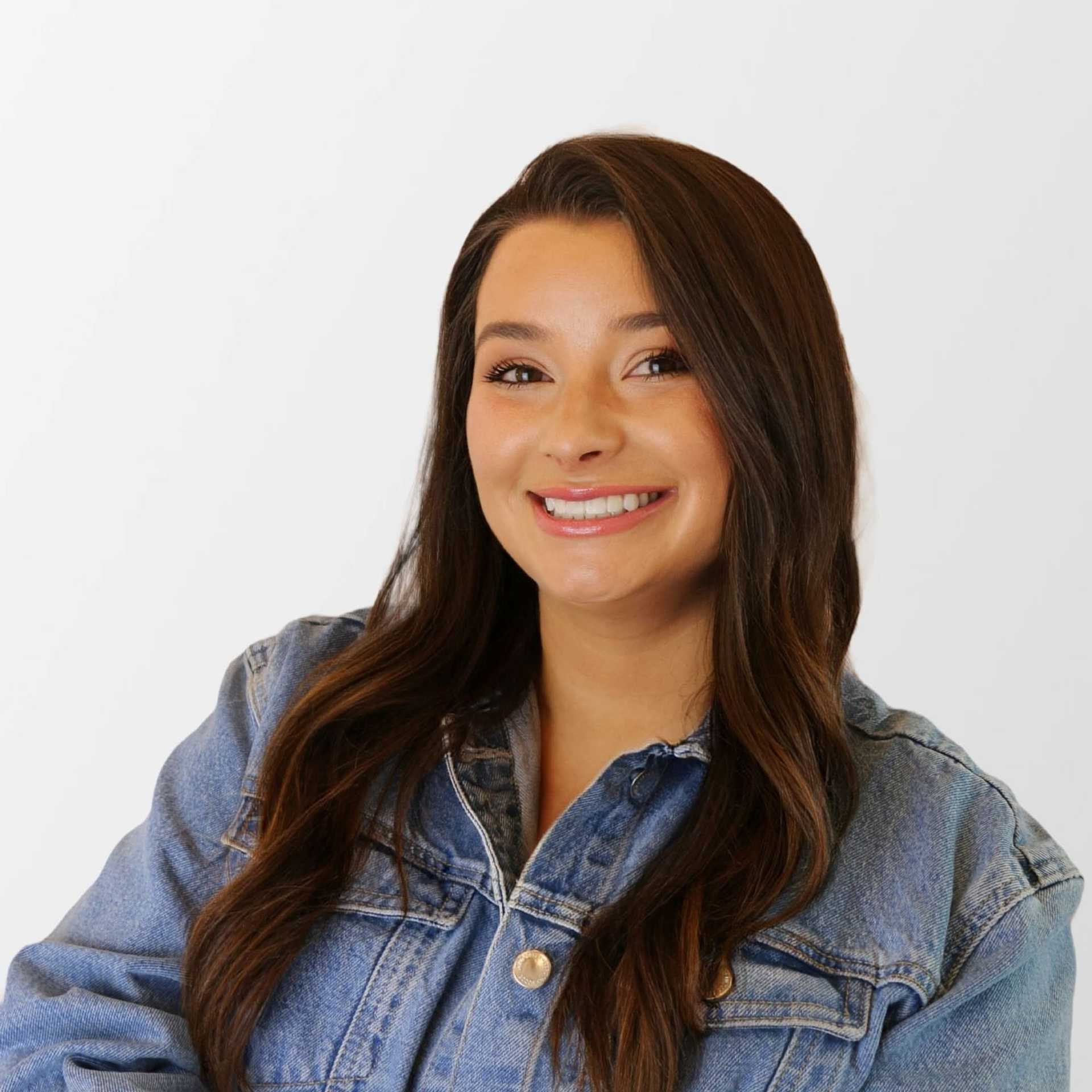 Portrait of Mollie Reams, a professional stylist at Chromatique Salon, showcasing their expertise and style.