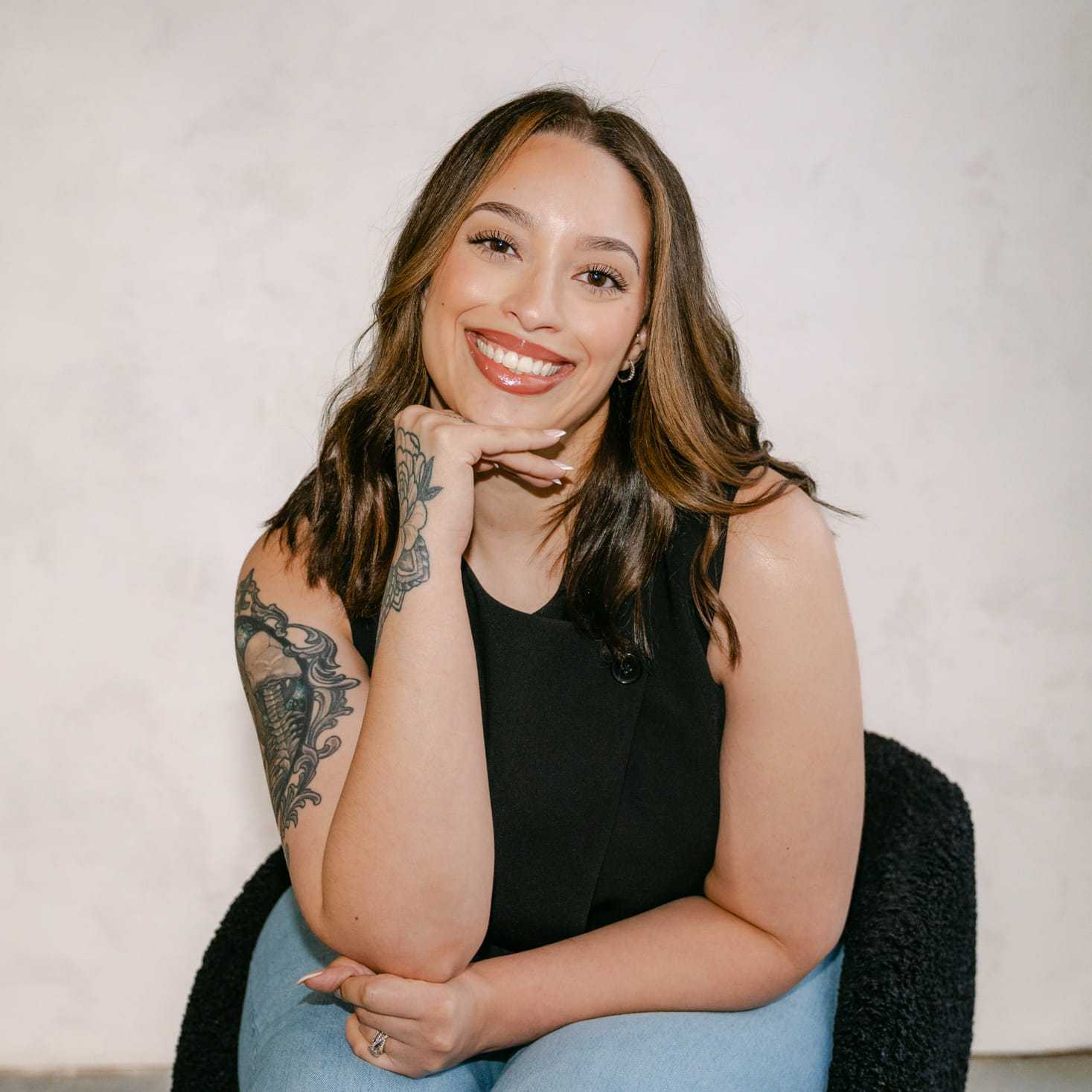 Portrait of Cierra Jarrell, a professional stylist at Chromatique Salon, showcasing their expertise and style.