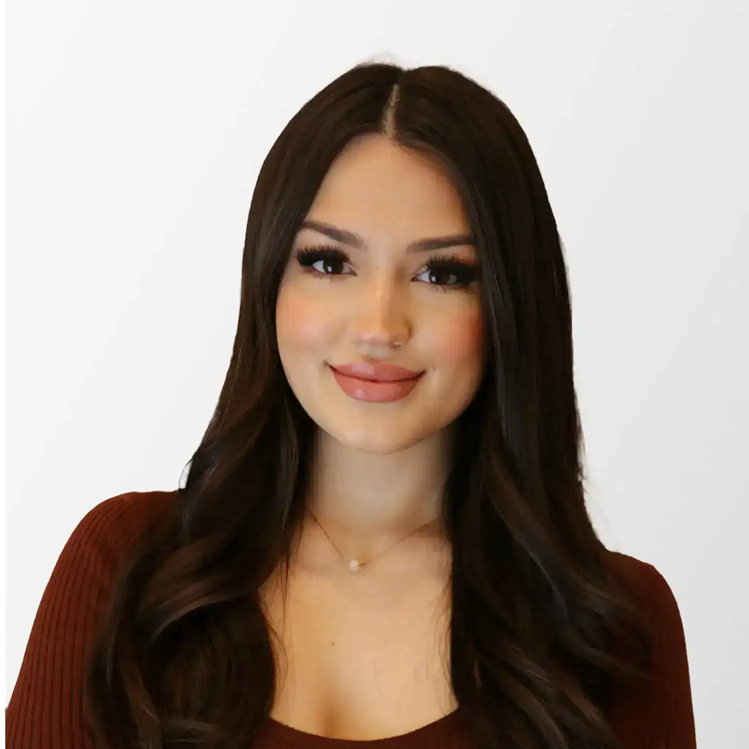 Portrait of Eden Dourte, a professional stylist at Chromatique Salon, showcasing their expertise and style.