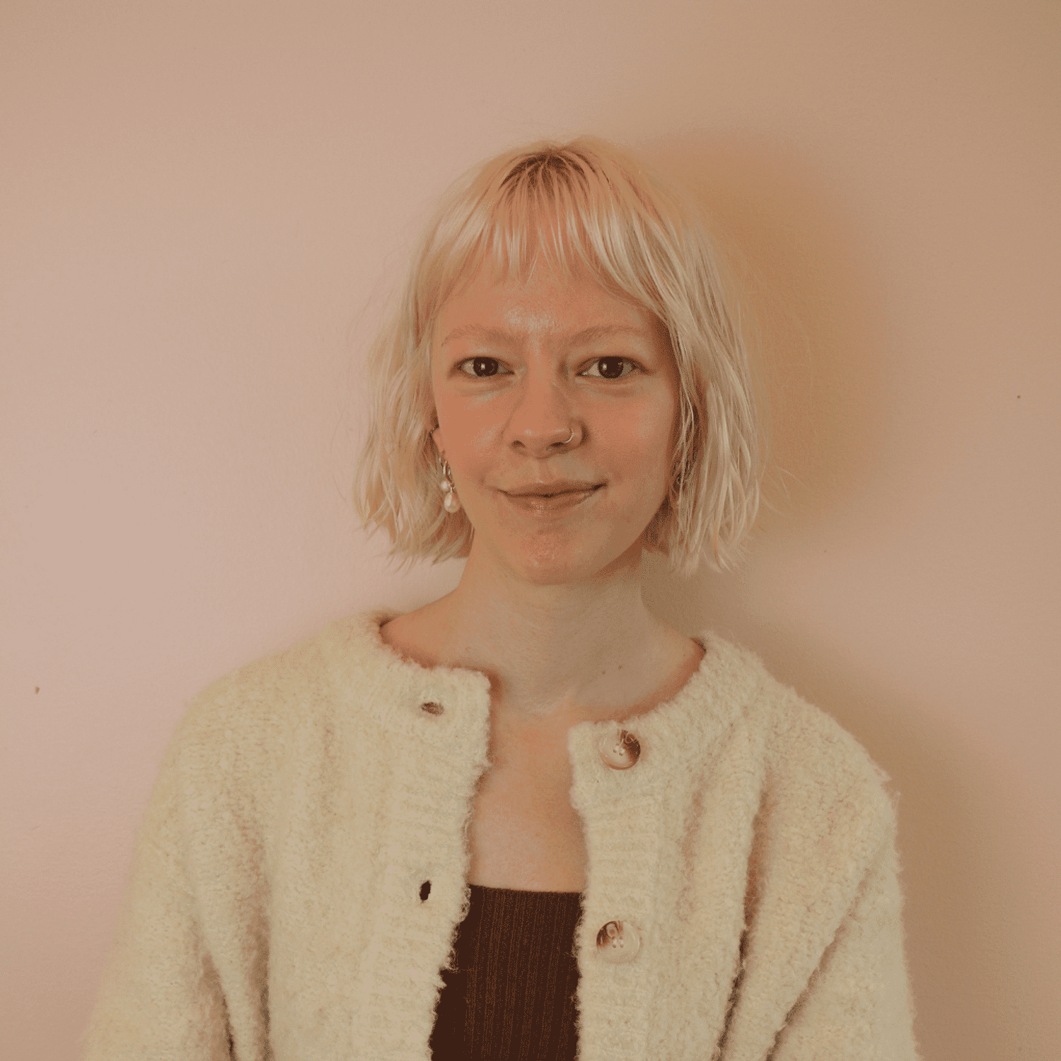 Portrait of Brooke Morgan, a professional stylist at Chromatique Salon, showcasing their expertise and style.