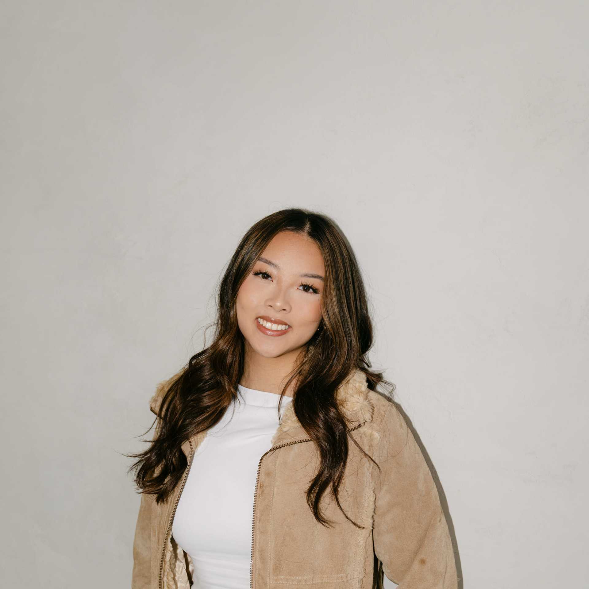 Portrait of Jessica Nguyen, a professional stylist at Chromatique Salon, showcasing their expertise and style.