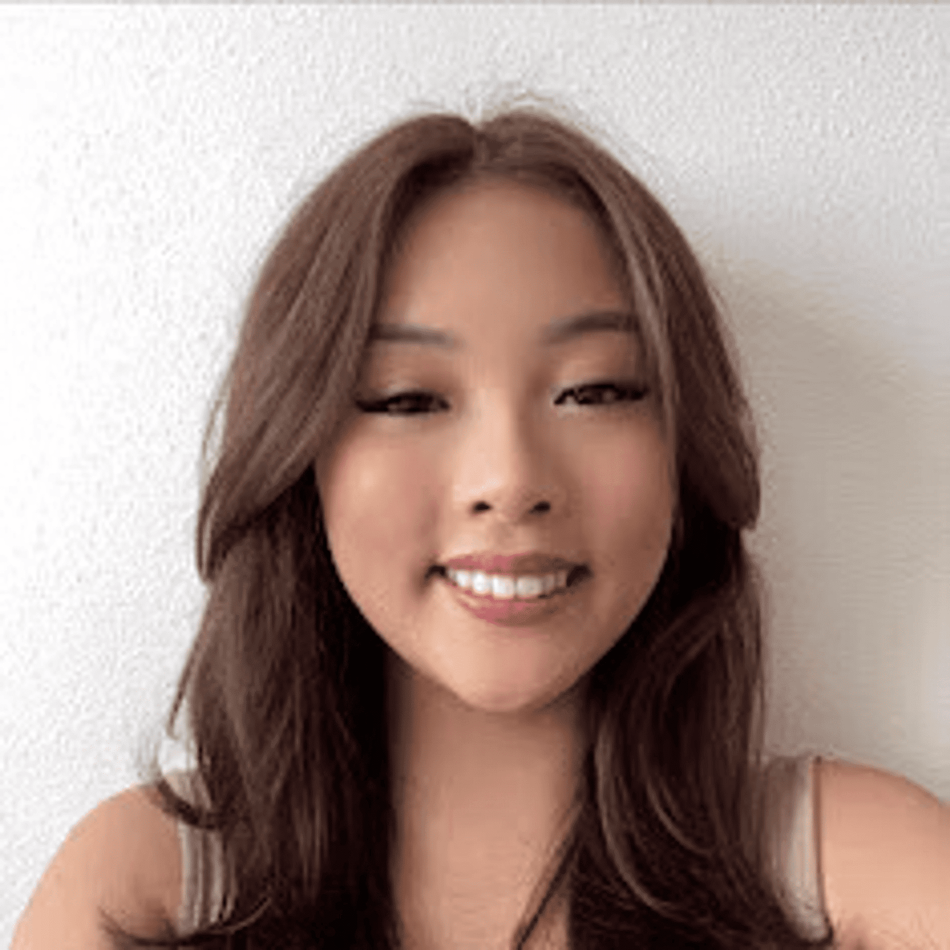 Portrait of Jessica Nguyen, a professional stylist at Chromatique Salon, showcasing their expertise and style.