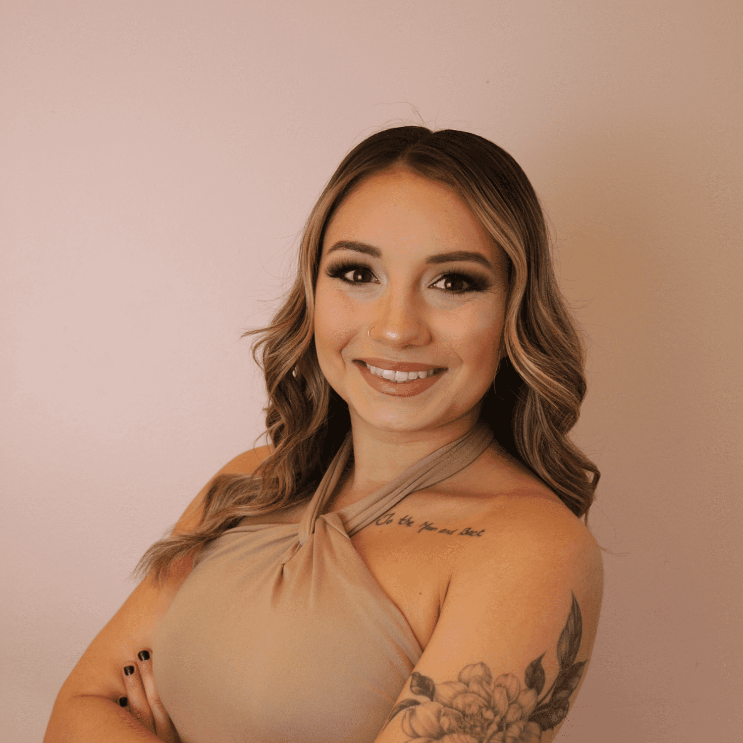 Portrait of Arianna Boprey, a professional stylist at Chromatique Salon, showcasing their expertise and style.