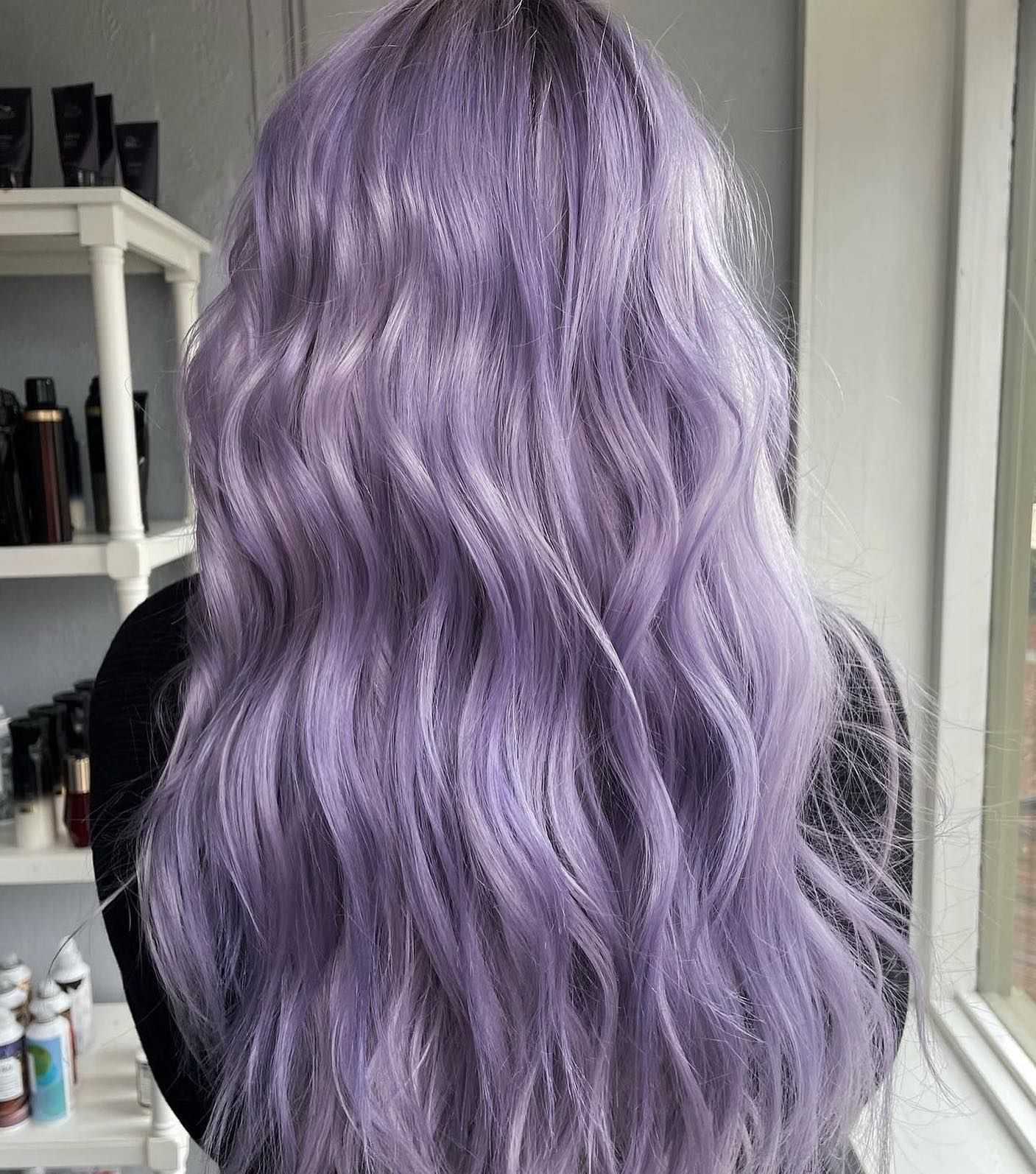 Wavy lavender hair with subtle highlights, styled in loose waves, shown from the back.