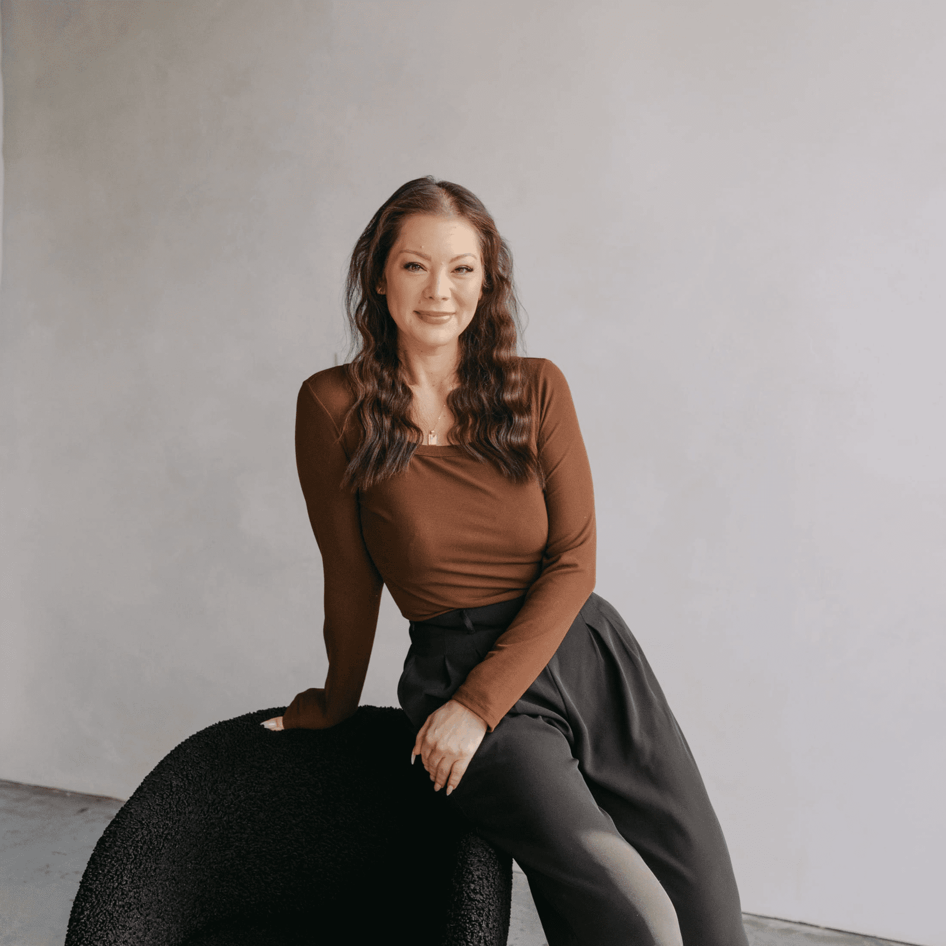 Portrait of Julie Swanson, a professional stylist at Chromatique Salon, showcasing their expertise and style.