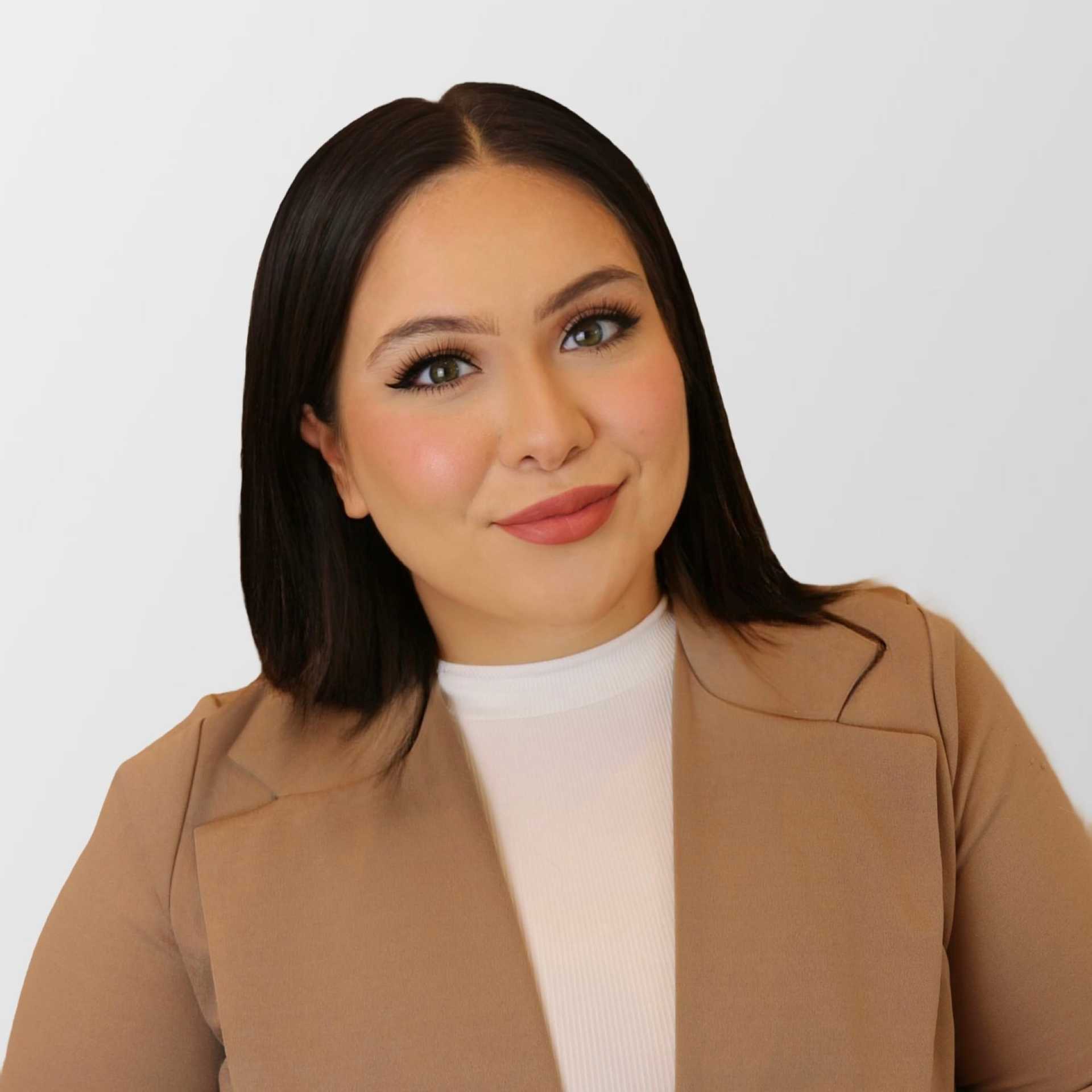 Portrait of Alina Campos, a professional stylist at Chromatique Salon, showcasing their expertise and style.