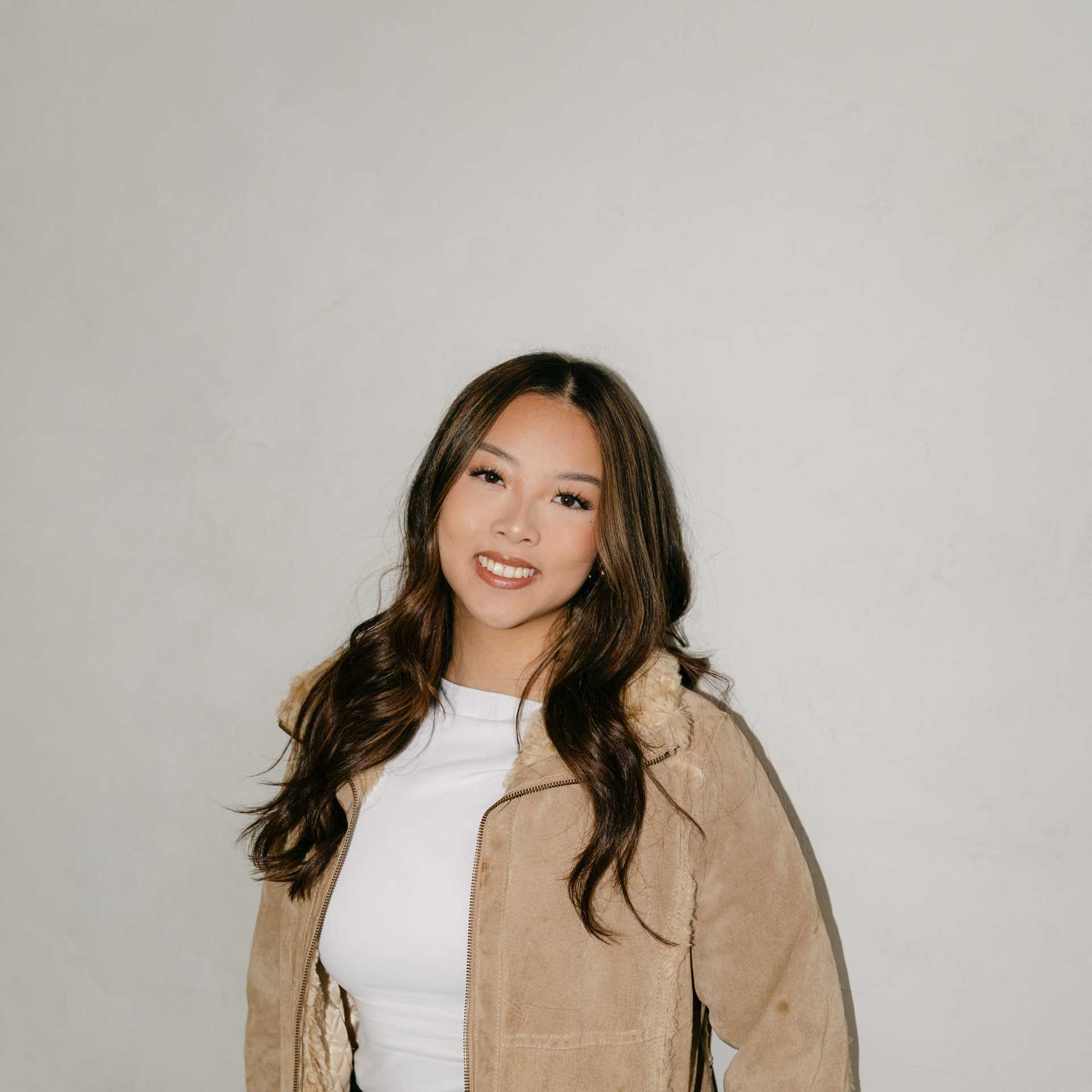 Portrait of Jessica Nguyen, a professional stylist at Chromatique Salon, showcasing their expertise and style.