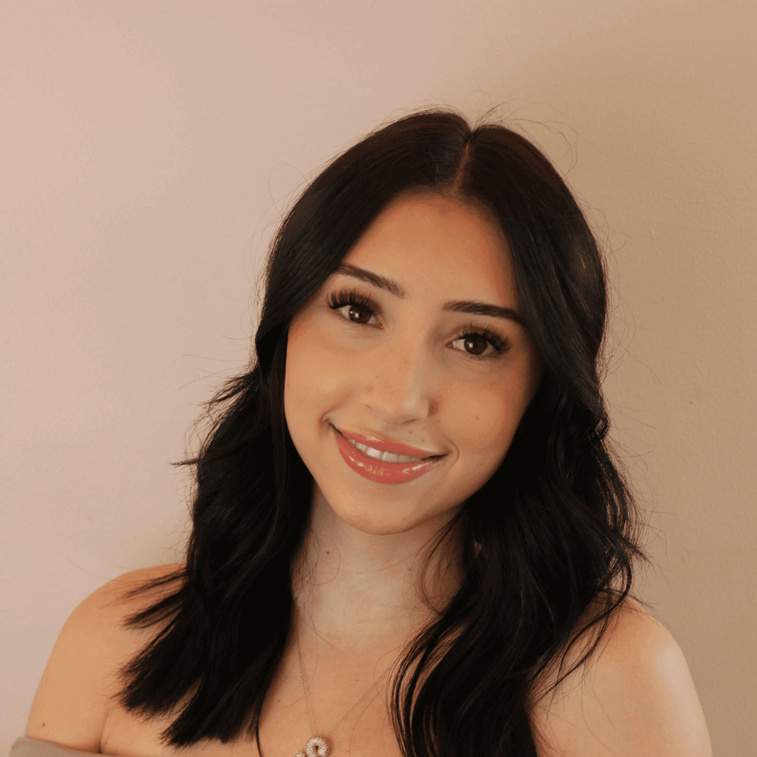 Portrait of Sophia Phillips, a professional stylist at Chromatique Salon, showcasing their expertise and style.