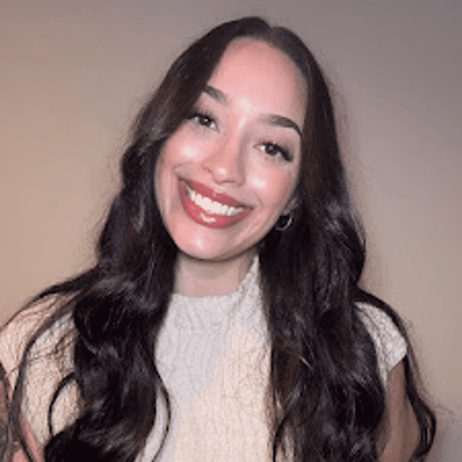 Portrait of Cierra Jarrell, a professional stylist at Chromatique Salon, showcasing their expertise and style.