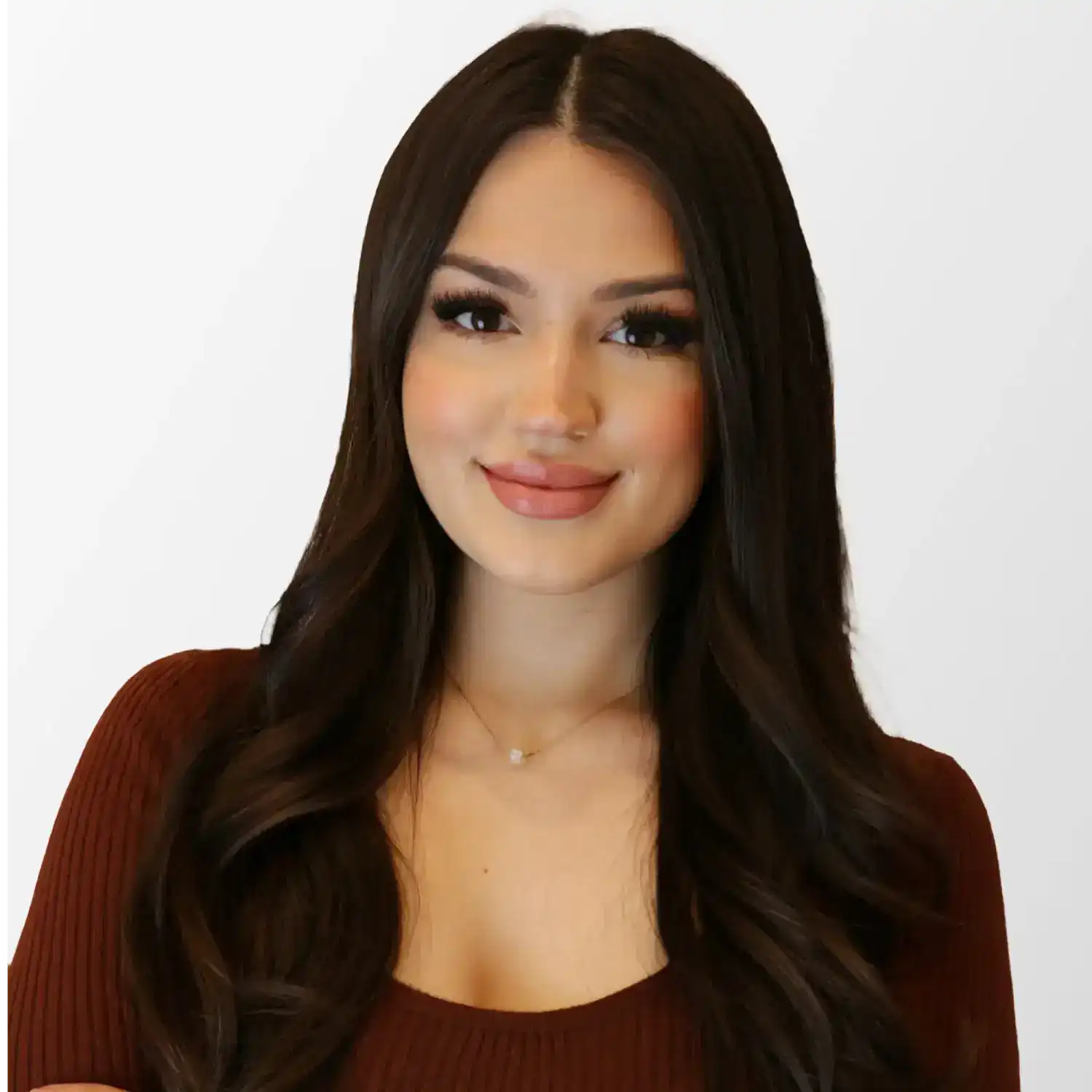 Portrait of Eden Dourte, a professional stylist at Chromatique Salon, showcasing their expertise and style.