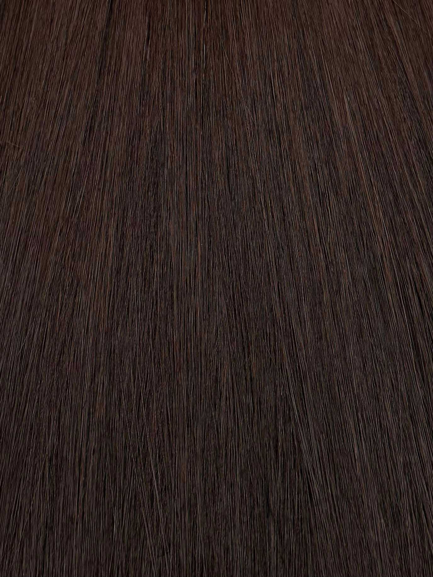 Close-up of straight dark brown hair texture.