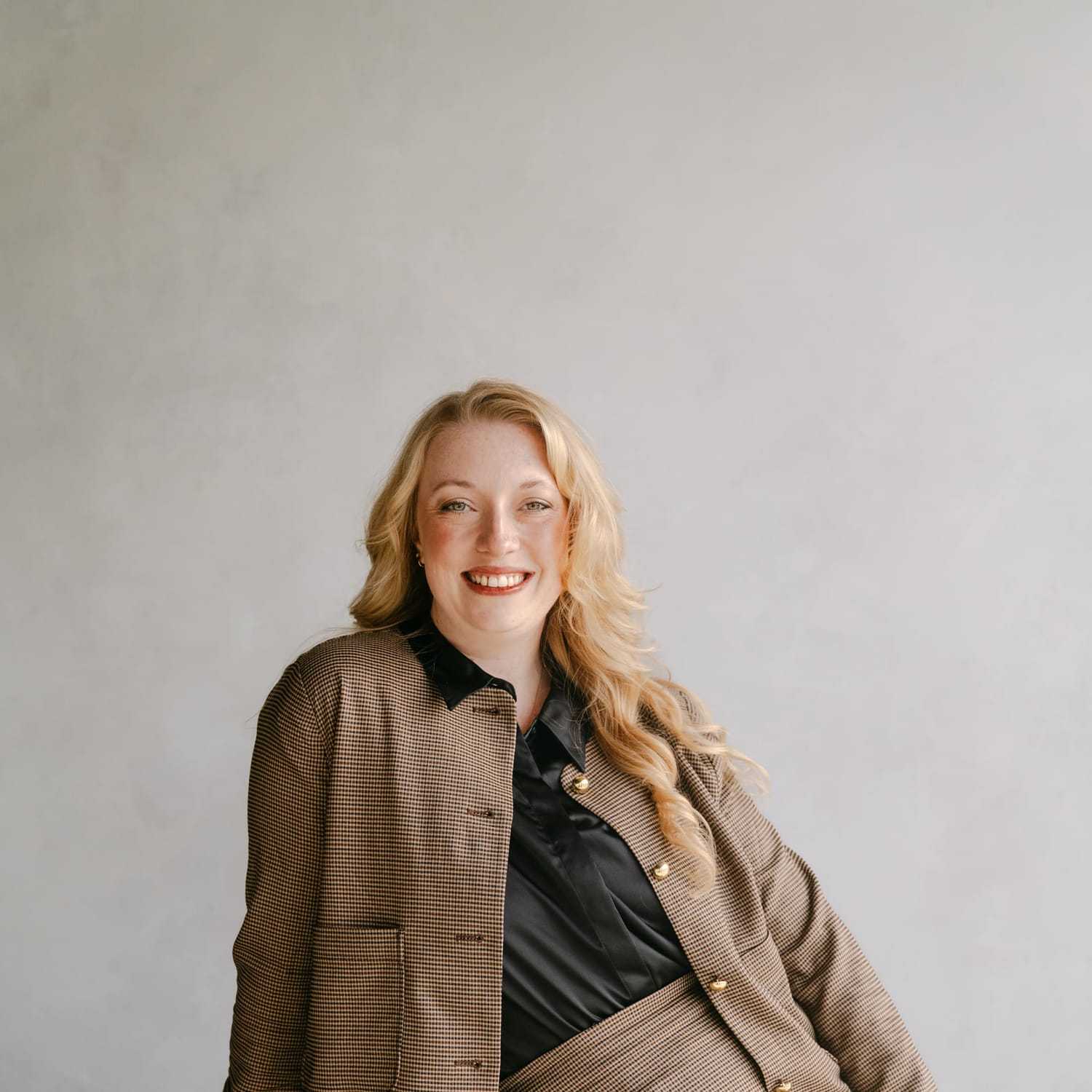 Portrait of Brianna Buckler, a professional stylist at Chromatique Salon, showcasing their expertise and style.