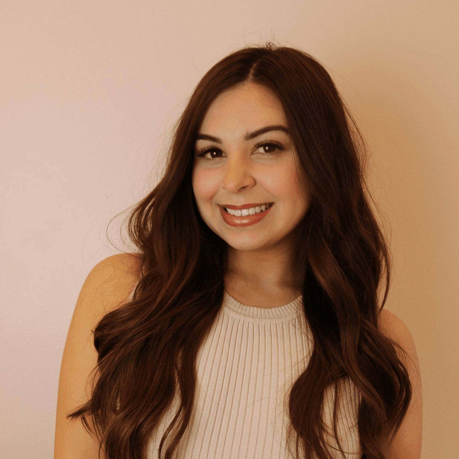 Portrait of Antonia Martinez, a professional stylist at Chromatique Salon, showcasing their expertise and style.