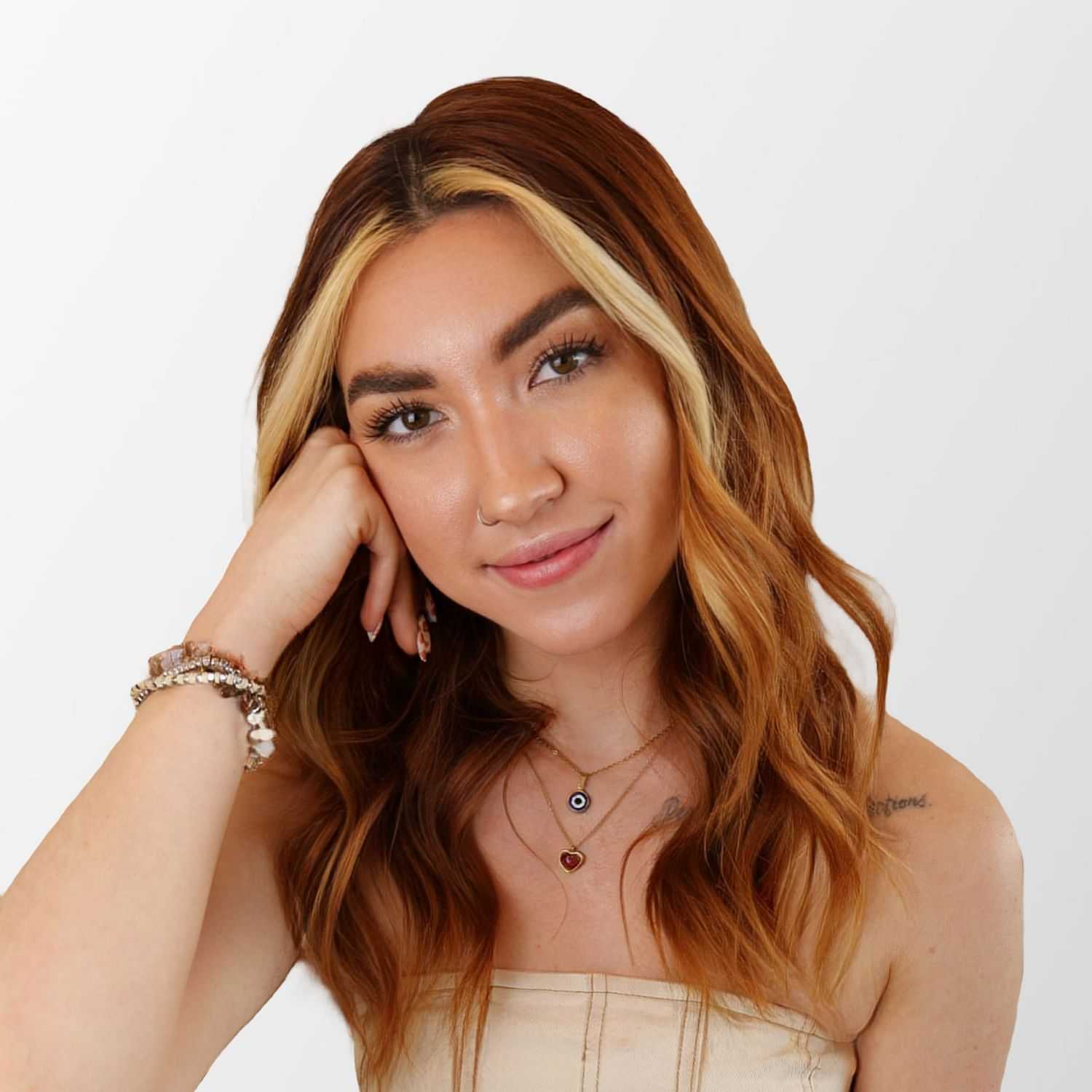 Portrait of Hannah, a professional stylist at Chromatique Salon, showcasing their expertise and style.