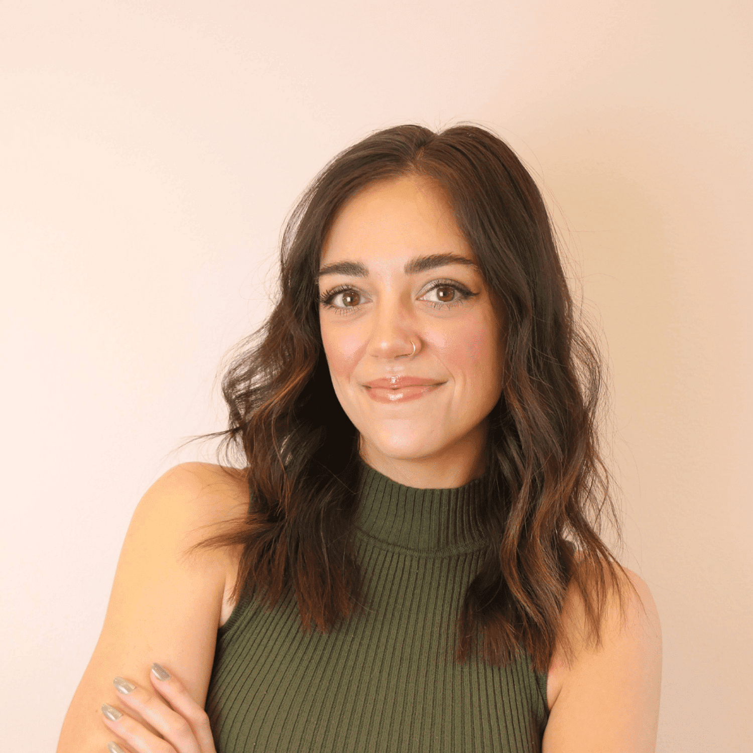 Portrait of Erin Dubots, a professional stylist at Chromatique Salon, showcasing their expertise and style.