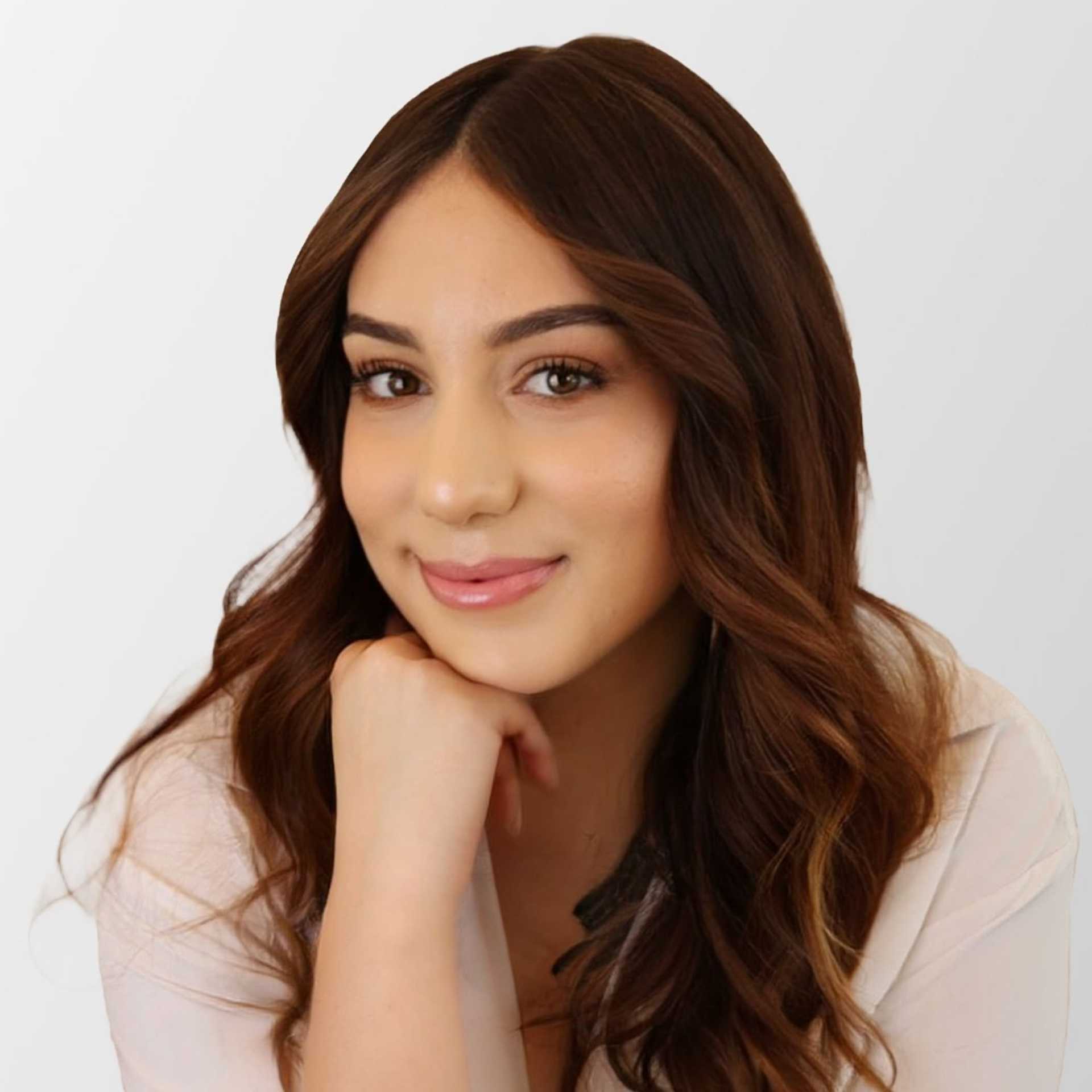 Portrait of Melissa Hawkins, a professional stylist at Chromatique Salon, showcasing their expertise and style.