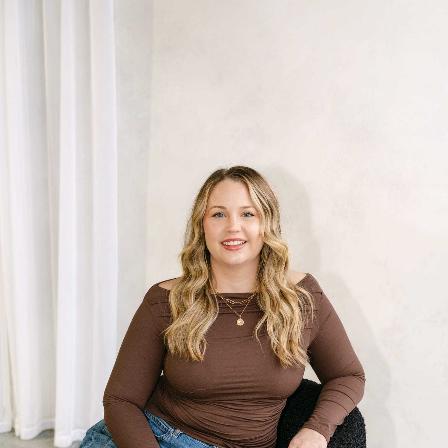 Portrait of Jessica Hegge, a professional stylist at Chromatique Salon, showcasing their expertise and style.